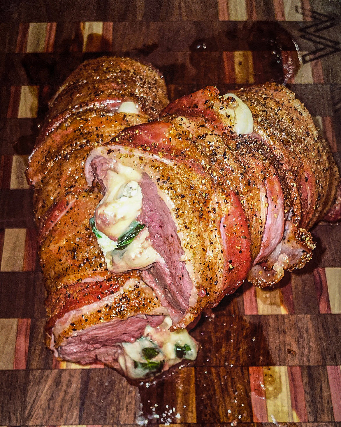 CANIS Cooks:  Bacon-Wrapped Stuffed Deer Loin